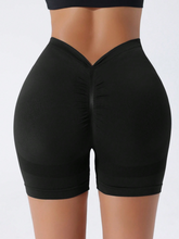 Cargar imagen en el visor de la galería, Pantalones cortos de yoga cintura V
